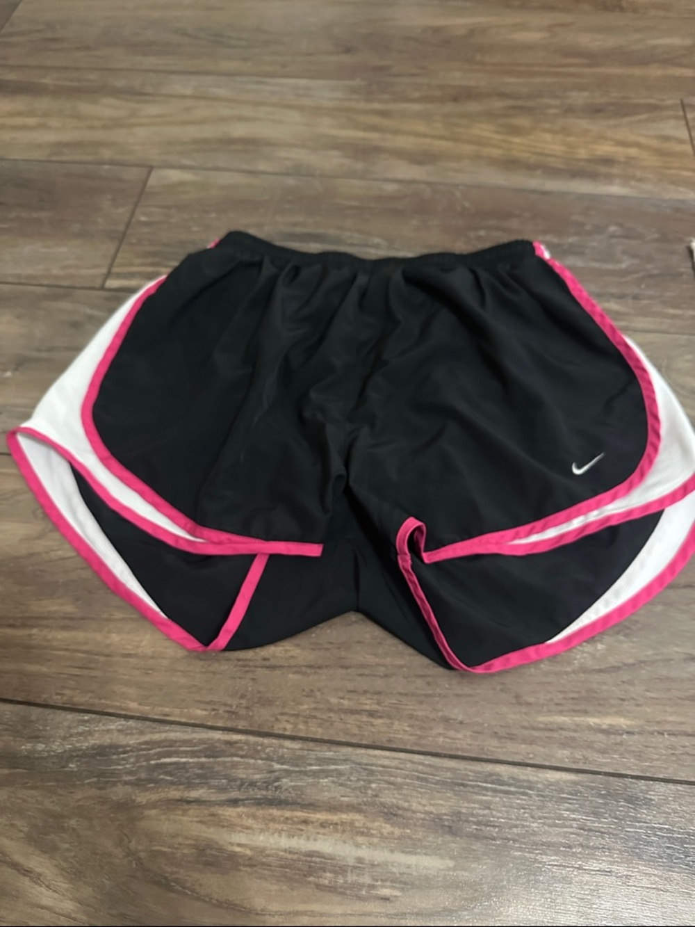 Nike Black Athletic Shorts with Pink Trim and White Panels